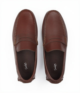 Mocasines 2170 de cuero para hombre, detalle de la suela con tachones de caucho