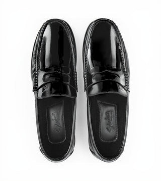 Mocasines 652 de cuero para hombre, detalle de la banda penny y la suela de cuero