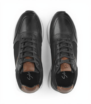 Deportivos 7029 de cuero para hombre, detalle de los paneles de lona y la suela TR